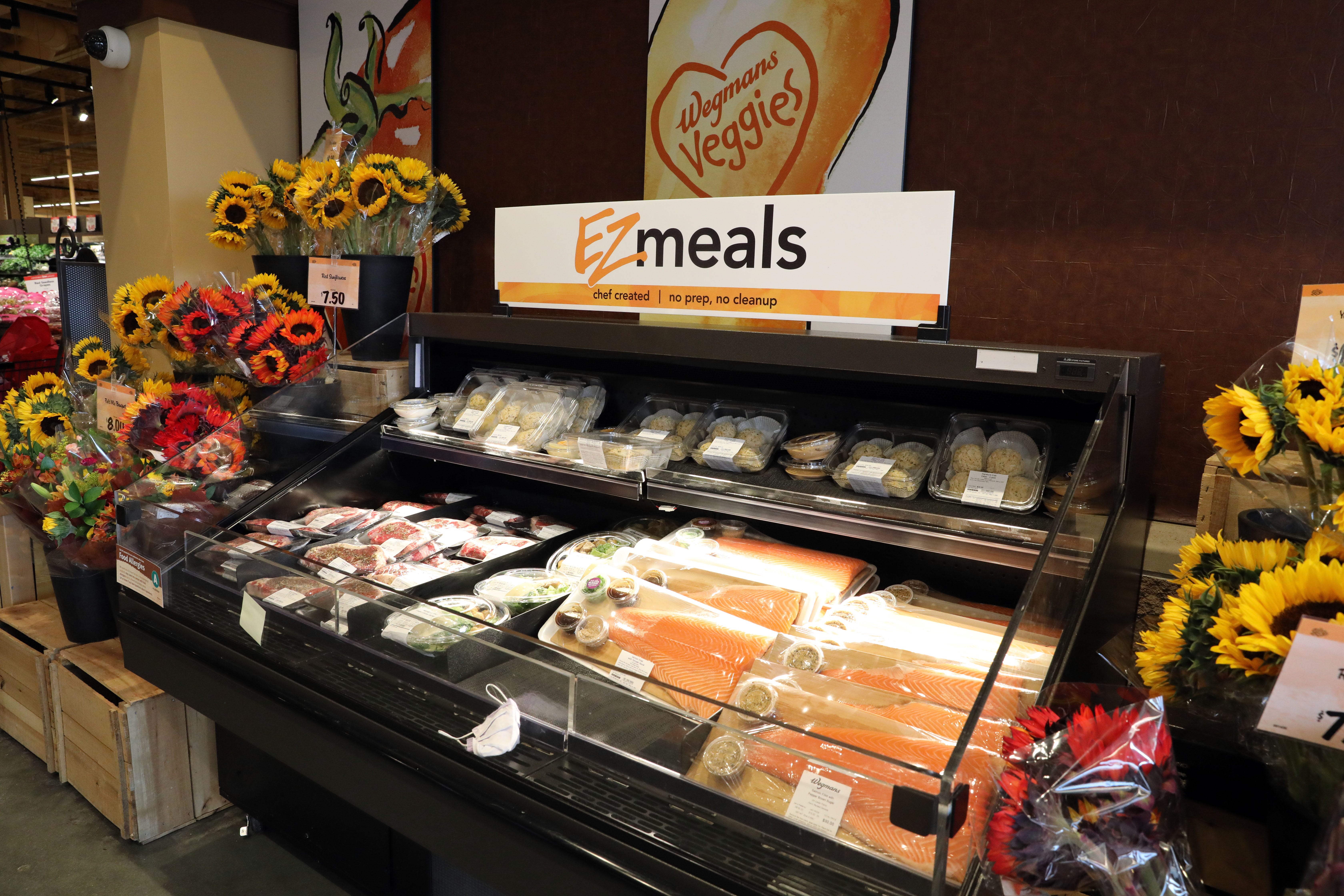 Steak and salmon meals packaged for the shopper on-the-go at the entrance of Wegmans Sept. 27, 2022, in Harrison.