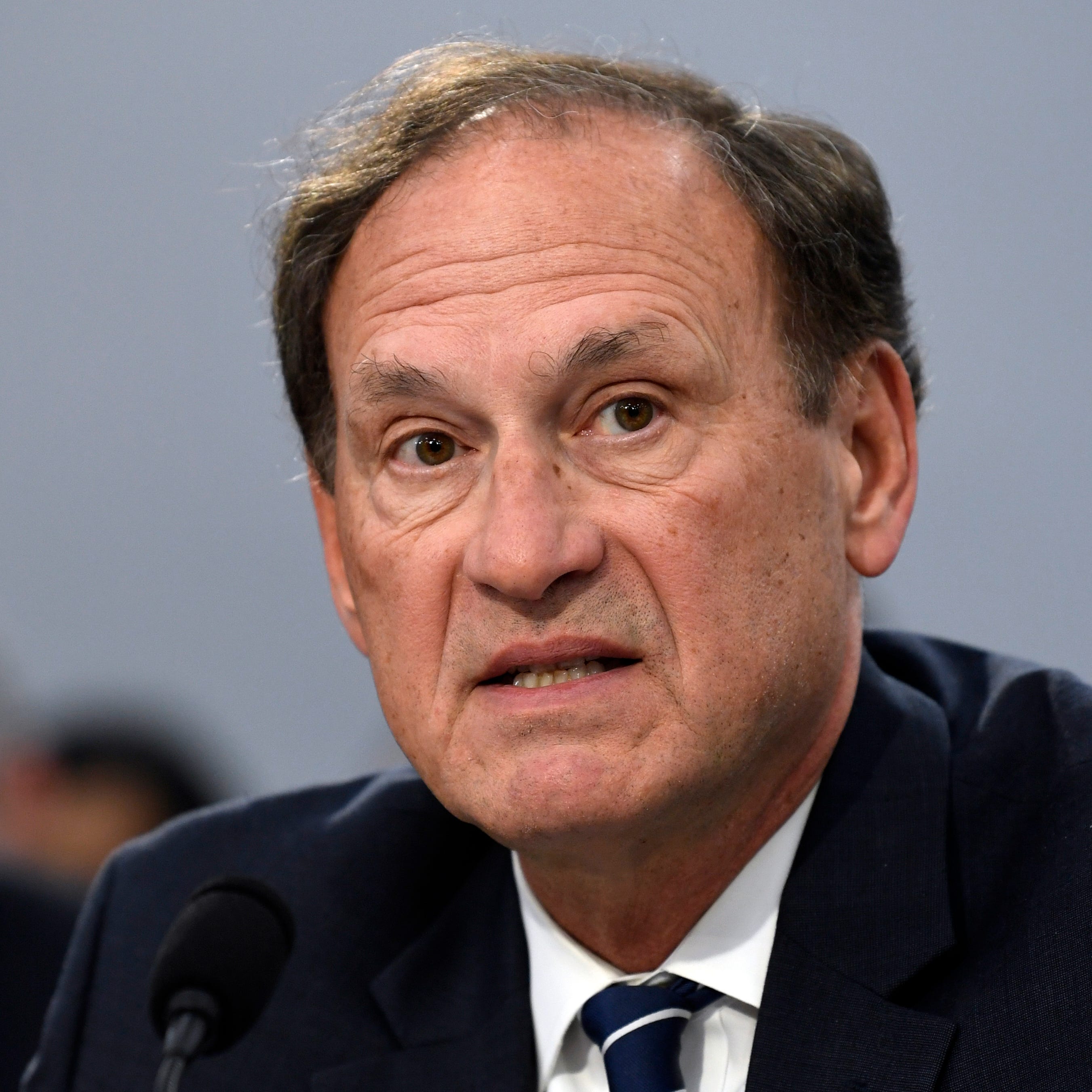 Associate Justice Samuel Alito, author of the Supreme Court's landmark opinion overturning Roe v. Wade, waved away criticism of the ruling from foreign leaders in remarks in July 2022 at a religious summit in Rome.