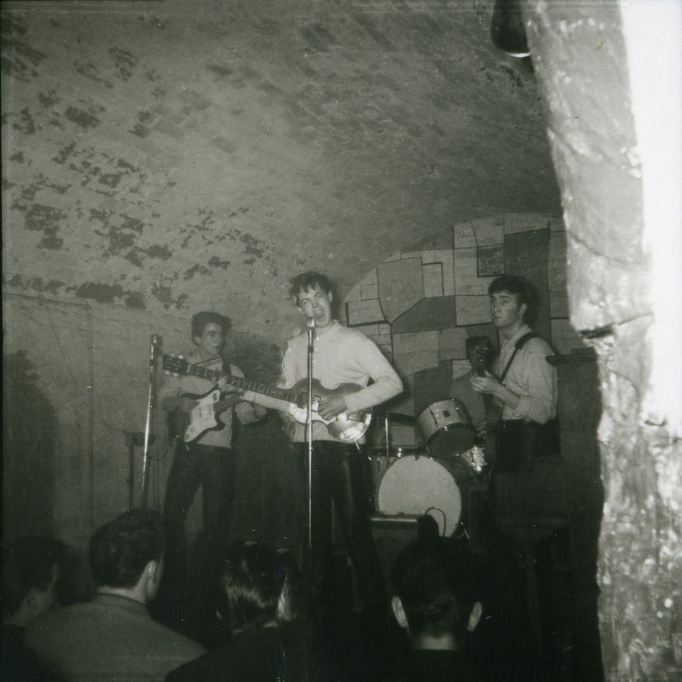 Two previously unseen photos of the Beatles show an early version of the band in the Cavern Club in Liverpool, England.