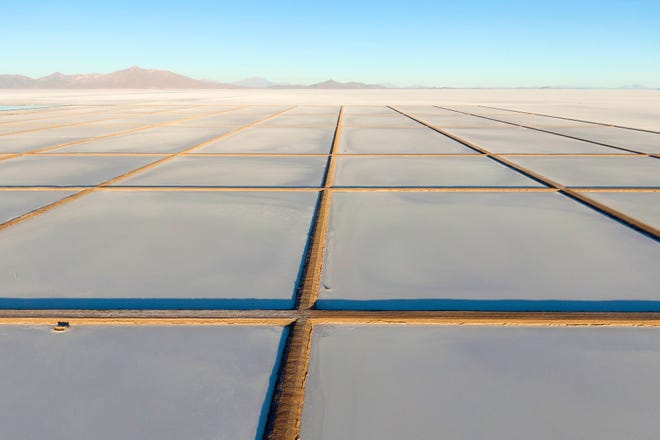 UYUNI, BOLIVIA - AUGUST 13: Aerial view of the salt recovery pools in different degrees of evaporation at the Llipi pilot Plant in the Uyuni Salt Flats on August 13, 2022 in Uyuni, Bolivia. The Uyuni Salt Flats, in the Potosi province, have the largest lithium reserves in the world.