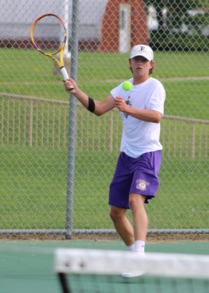 Fowlerville No. 1 singles player Lucas Anderson won his school-record 64th career match Tuesday against Hemlock.