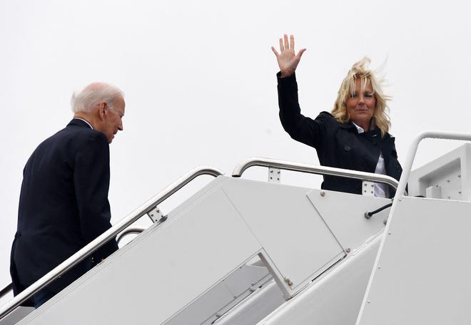 President Joe Biden and first lady Jill Biden board Air Force One at Joint Base Andrews in Maryland on October 5, 2022, before traveling to Florida to assess recovery efforts from Hurricane Ian.