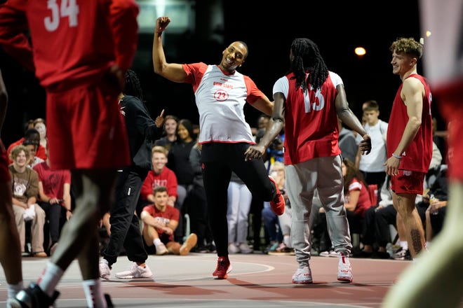 Oct 6, 2022; Columbus, OH, USA;  Ohio State men's basketball forward Zed Key (23) dances during the “Buckeyes on the Blacktop” event on the rec basketball courts behind Ohio Stadium. Mandatory Credit: Adam Cairns-The Columbus Dispatch