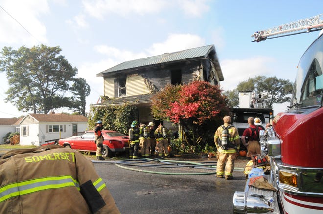 In this Daily American file photo, firefighters from the Somerset Volunteer Fire Department and five other local fire departments responded to a home fire in Somerset in October of 2022.