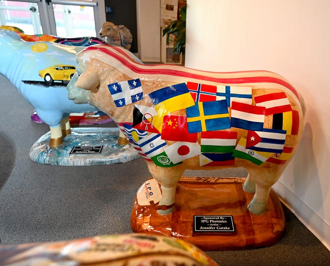 This Slater's Sheep currently at the Samuel Slater Experience, sponsored by IPG Photonics in Oxford, will move to the Webster Fire Department. The piece features images of flags from around the world, from places where IPG does business, by artists Jennifer and Julie Gatzke.