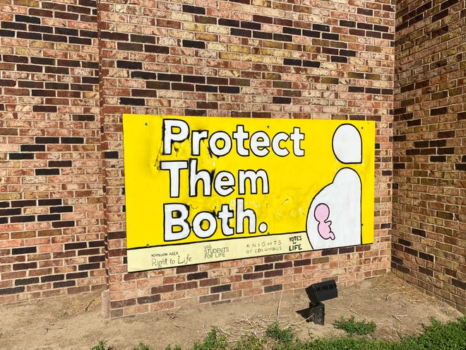 The student anti-abortion group, Yotes for Life, meets just off campus at the St. Thomas More Newman Center. On the outside of the building, a large sign signals the group’s stance.