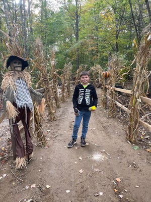 A sneak peek in daylight at the Halloween walk, Aurora Woods, created by 10-year-old Jacob Hartford of Barrington.