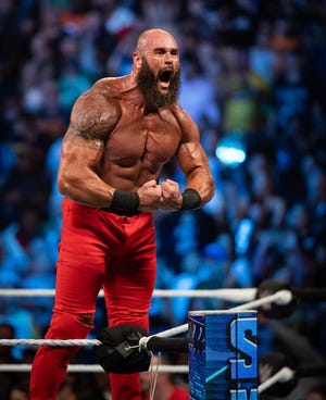 WWE star Braun Strowman roars at the crowd during WWE Friday Night SmackDown.