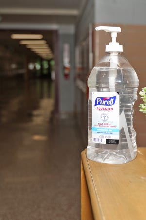 A bottle of hand sanitizer is pictured Thursday, Oct. 6, 2022, in a hallway at Patterson Intermediate Learning Center in Tecumseh.