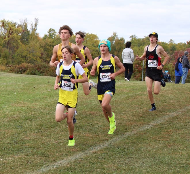 Parker Campbell, Austin Sulier and Ryan Joyce run for Erie Mason in the Hudson Boosters Invitational on Saturday, Oct. 8, 2022. Mason took the team championship.