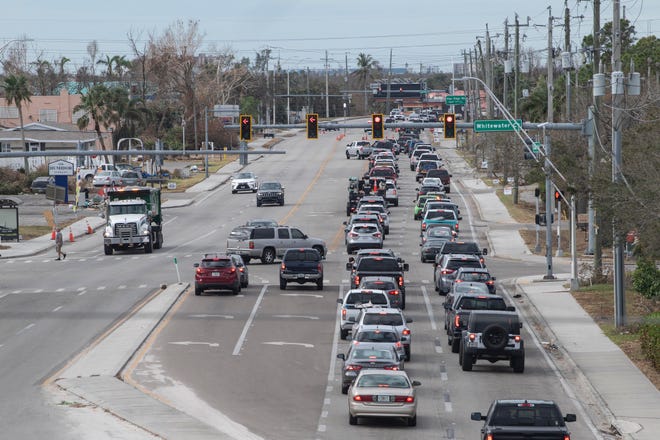Drivers caught in traffic going south on San Carlos Blvd. at Summerlin Rd. on Sunday, October 9, 2022 towards Fort Myers Beach, Fla.