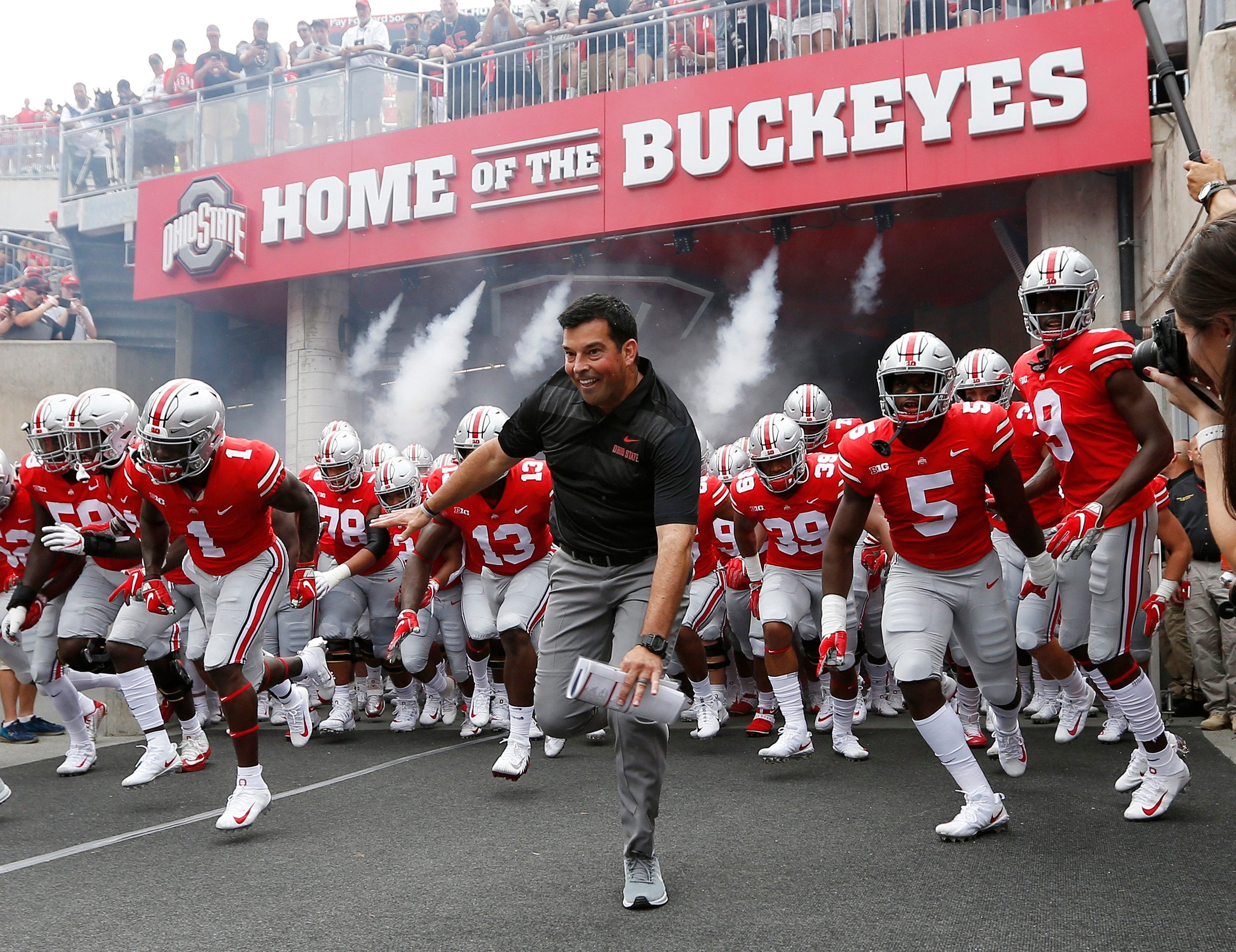 Ohio State Buckeyes head coach Ryan Day leads his team onto the field prior to the NCAA football game against Oregon State at Ohio Stadium in Columbus on Sept. 1, 2018. [Adam Cairns / Dispatch]