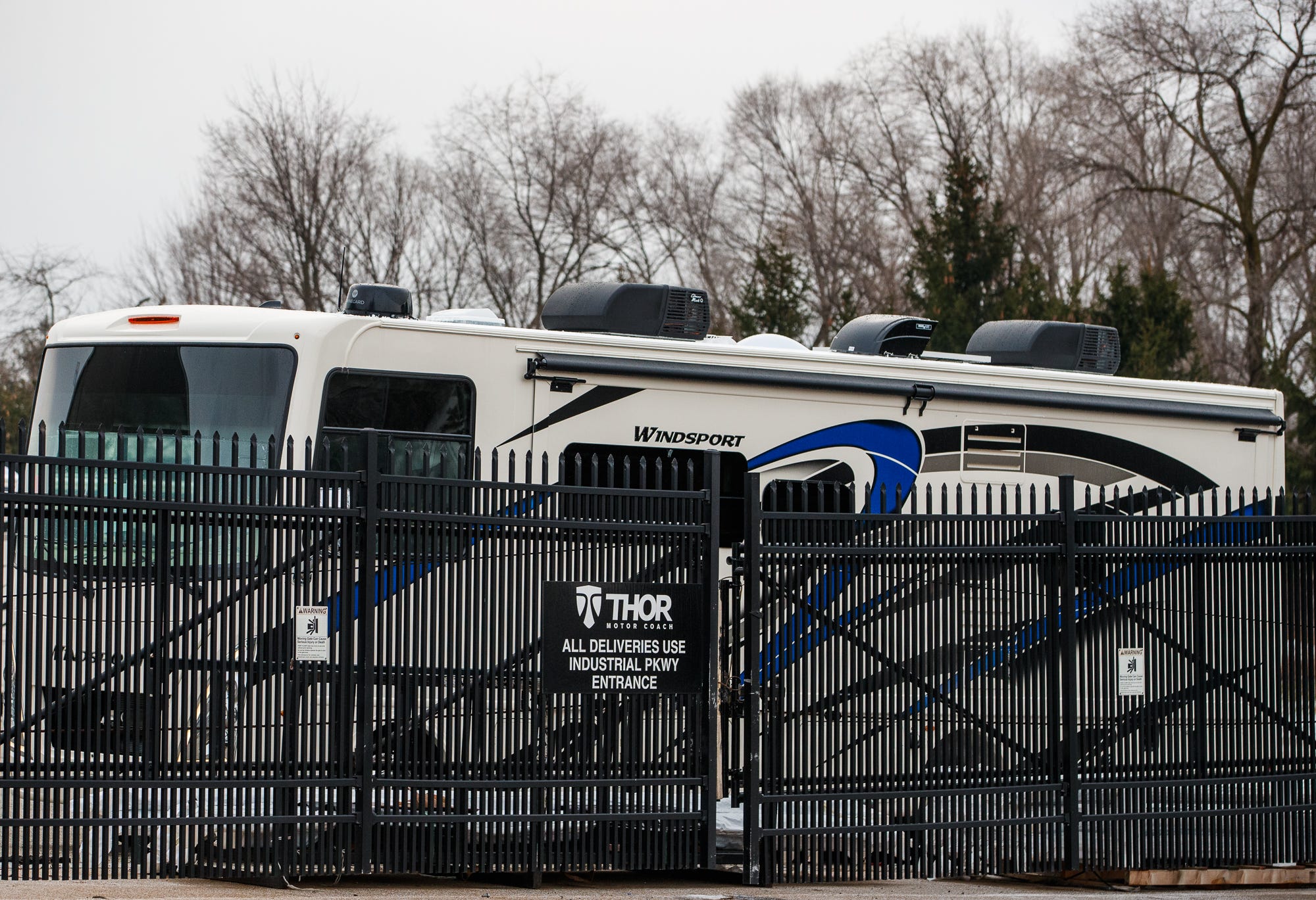 An RV sits inside a fenced area at Thor Motor Coach plant 750, located at 604 Middleton Run Road in Elkhart, Indiana, earlier this year.