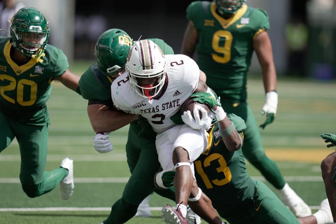 Despite missing the final three games of the season, Texas State wide receiver Ashtyn Hawkins led the team in catches, receiving yards and touchdown catches. He has reversed his decision to transfer, announcing that he'll be back for the 2023 season.