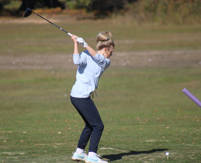 Cheboygan junior Katie Maybank works on her game at the Cheboygan Golf & Country Club driving range on Tuesday afternoon. Maybank, who didn't pick up the game of golf until March 2020, will be representing the Chiefs individually in the Division 3 girls golf finals at Forest Akers East Golf Course at Michigan State University this Friday and Saturday.