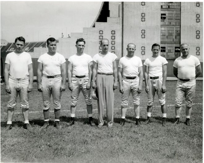 Ohio State football coaching staff in 1942 . From left: Paul Bixler , Fritz Mackey , Hugh McGranahan , Paul Brown , Carroll Widdoes , Tippy Dye and Ernie Godfrey. (Photo: Columbus Dispatch)