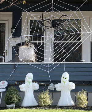Residents decorate their homes for Halloween in Massillon on Monday, Oct. 10, 2022.