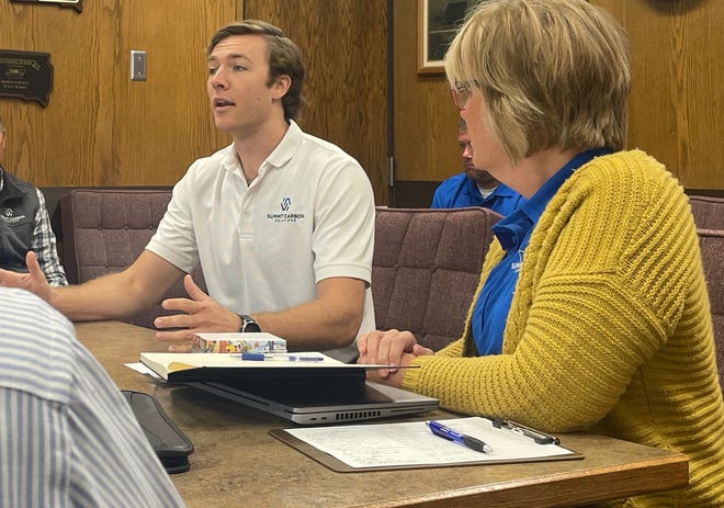 Aaron Eldridge, Summit Carbon Solutions project manager in South Dakota talks about the carbon dioxide pipeline project with Brown County commissioners Tuesday. Seated next to Eldridge is Dana Siefkes Lewis, director of public affairs in South Dakota.