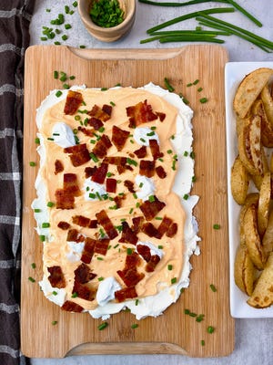 Loaded potato boards are the new butter boards.