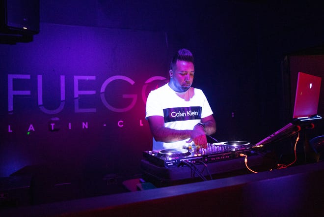 DJ Kalef plays music at Fuego Latin Club in Keizer, Ore. on Saturday, Oct. 8, 2022.