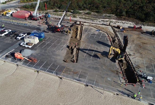 Covell's Beach parking lot is being trenched out in two locations where the east, at right, and west Vineyard Wind cables will make landfall and then be routed to a new substation being built in Independence Park. The east cable work will start Nov. 1 and the west on Dec. 1.