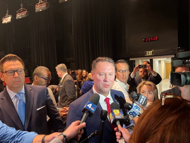 Republican nominee for governor Dan Cox, a state delegate, answers reporters questions after the season's only debate at the MPT studio in Owings Mills, Maryland on Oct. 12, 2022.