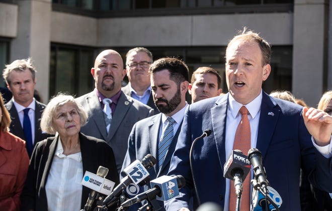Lee Zeldin, Republican candidate for Governor, speaks at a news conference at the Westchester County Courthouse in White Plains Oct. 12, 2022. Zeldin, along with Mike Lawler,  Republican candidate for the 17th congressional district, left, spoke out in opposition to the parole of Anthony Blanks, who has spent 46 years in prison for the killing of Larchmont police officer Arthur Dematte. At left is Alice Dematte, widow of Arthur Dematte. 