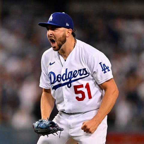 Dodgers relief pitcher Alex Vesia gets out of the 