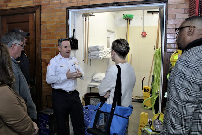 City of Marion Fire Department Chief Chuck Deem talks with visitors during a tour of Station 1 which is located at 186 S. Prospect St. in downtown Marion. Marion City Council voted to place a 2.75-mill tax levy on the Nov. 8 general election ballot that would provide funding to build a new fire station to replace the 110-year-old Station 1 and pay for new vehicles and equipment.