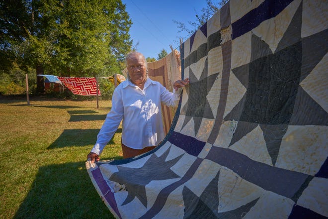 Quilting styles in Gee's Bend are specific to the area. These quilts hung throughout the community during the Airing of the Quilts Festival.