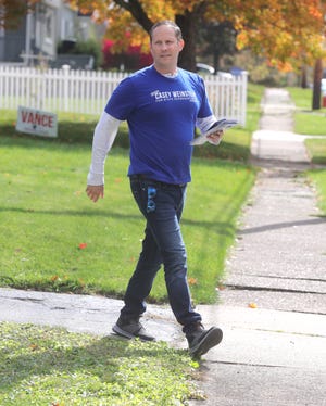 State Rep. Casey Weinstein goes door to door in Cuyahoga Falls as he seeks reelection.