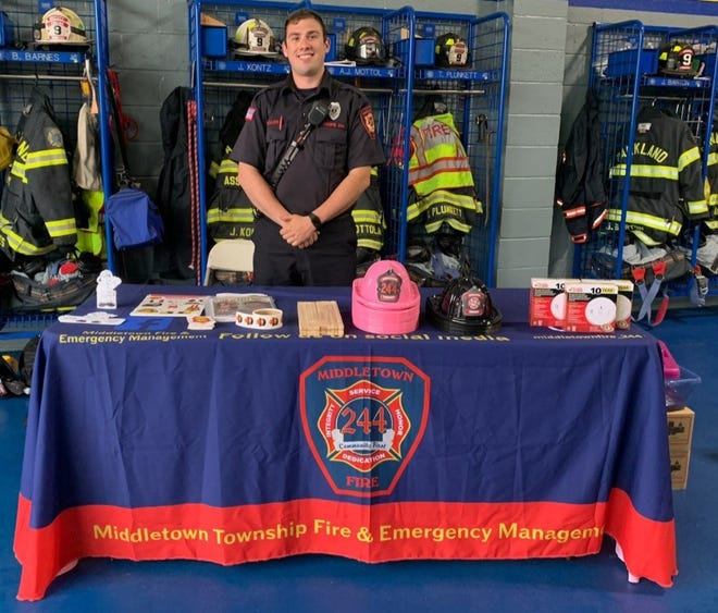 Riley Collins, a Middletown Township fire inspector and fire prevention coordinator, shows some of the items that will be on display at the Middletown Township Fire Prevention Expo Saturday at Oxford Valley Mall.