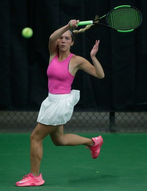 Xavier's Maggie McGinnis competes at the 52nd WIAA girls individual state tennis tournament last week. McGinnis leads the Hawks into Saturday's Division 2 state team semifinal against Altoona.