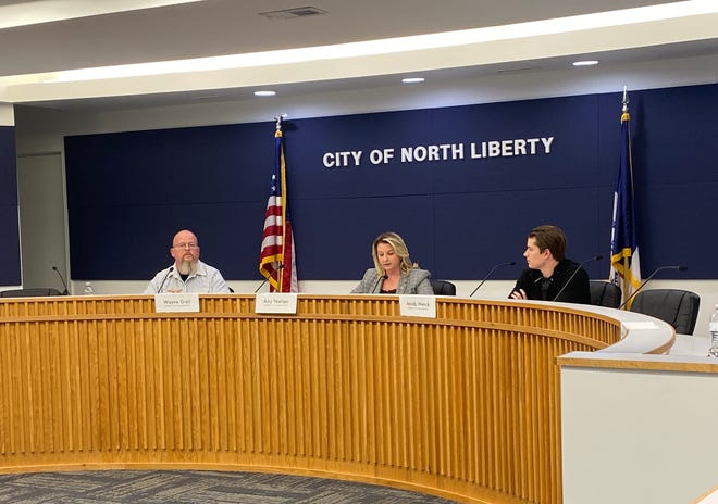 Republican Wayne Grell (left), Democratic state Rep. Amy Nielsen (center) and Libertarian Jacob Wenck participate in a League of Women Voters candidate forum at North Liberty City Council chambers on Thursday. The three are running for Iowa House District 85 covering North Liberty and northwestern Johnson County.