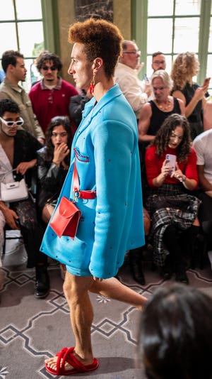 Multiple models wore bags at Paris Fashion Week made in Knoxville by Honeymouth. 