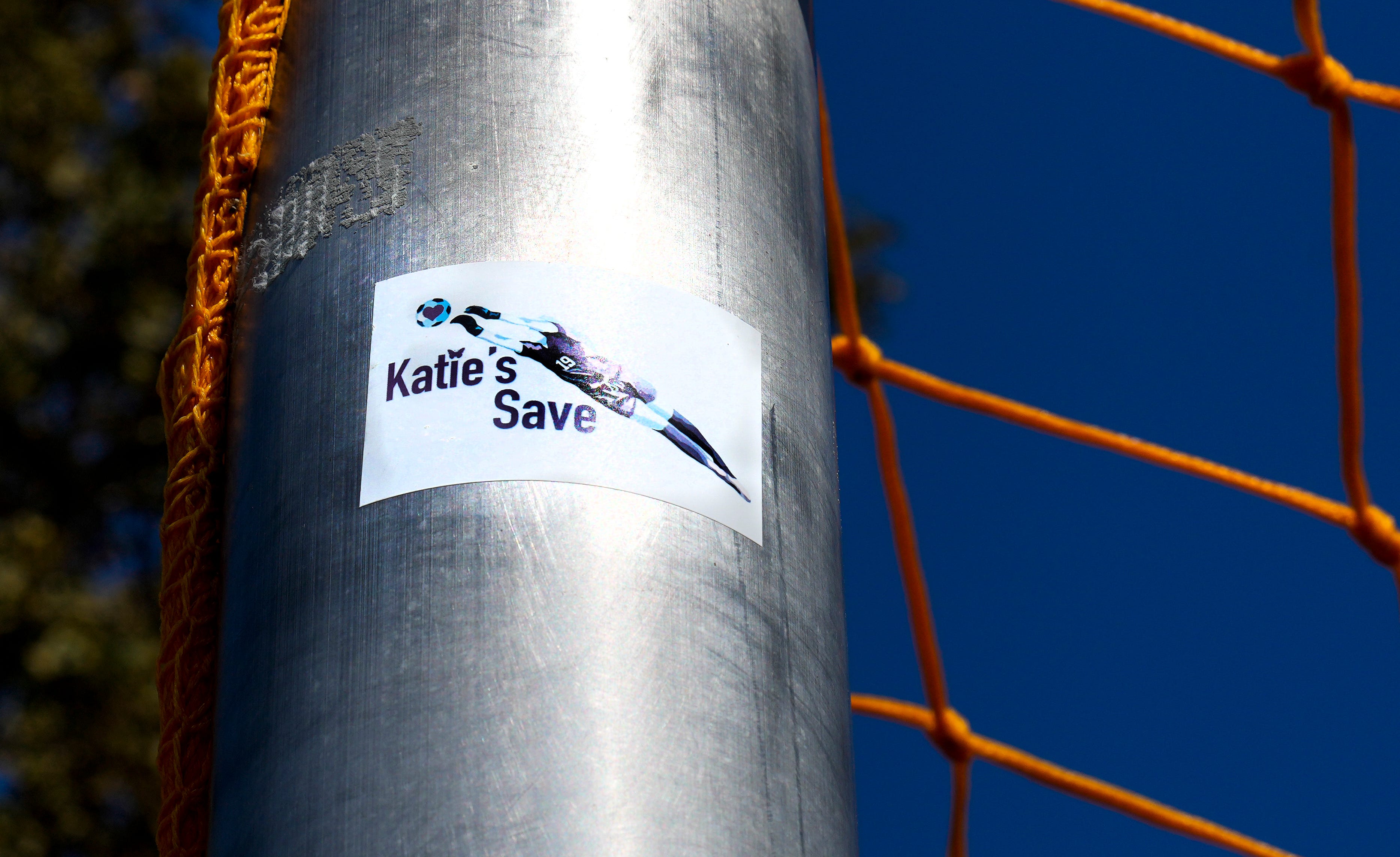 A sticker on a goalpost at a park in Newbury Park, California, where Katie Meyer practiced with her father, Steve.