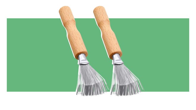 This handy tool removes hair from your brush in a cinch.
