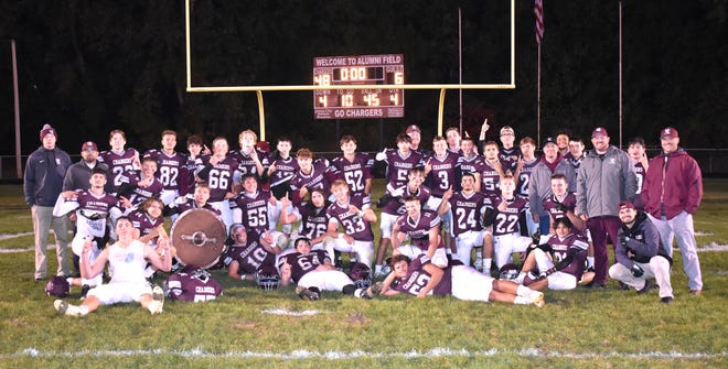 The Union City Chargers wrapped up the Big 8 Conference championship with a rout of Springport Friday night.