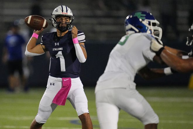 American Heritage-Delray quarterback Joshua Ramos (1) drops back to pass against Somerset Academy-Canyons in the first quarter on Friday, Oct. 10, 2022 in Delray Beach. 
