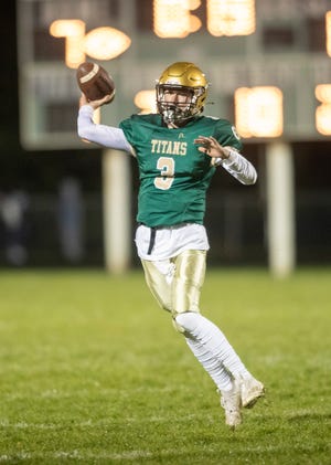 Boylan's Connor Dennis, shown throwing against Guilford on Oct. 14, 2022, led the NIC-10 in passing in a year a record seven QBs passed for more than 1,000 yards and also set a record with seven throwing for at least 10 TDs.
