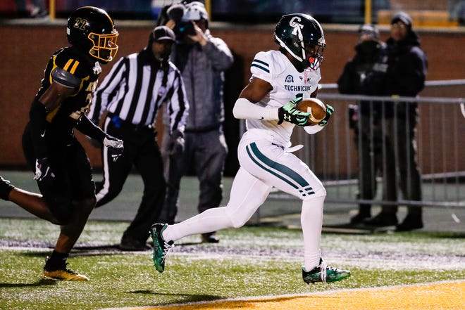 Cass Tech wide receiver Corey Sadler Jr. (1) was in the end zone for a touchdown against King during the first half of the PSL Championship game at Adams Field in Detroit, Friday, October 14, 2022. collide.