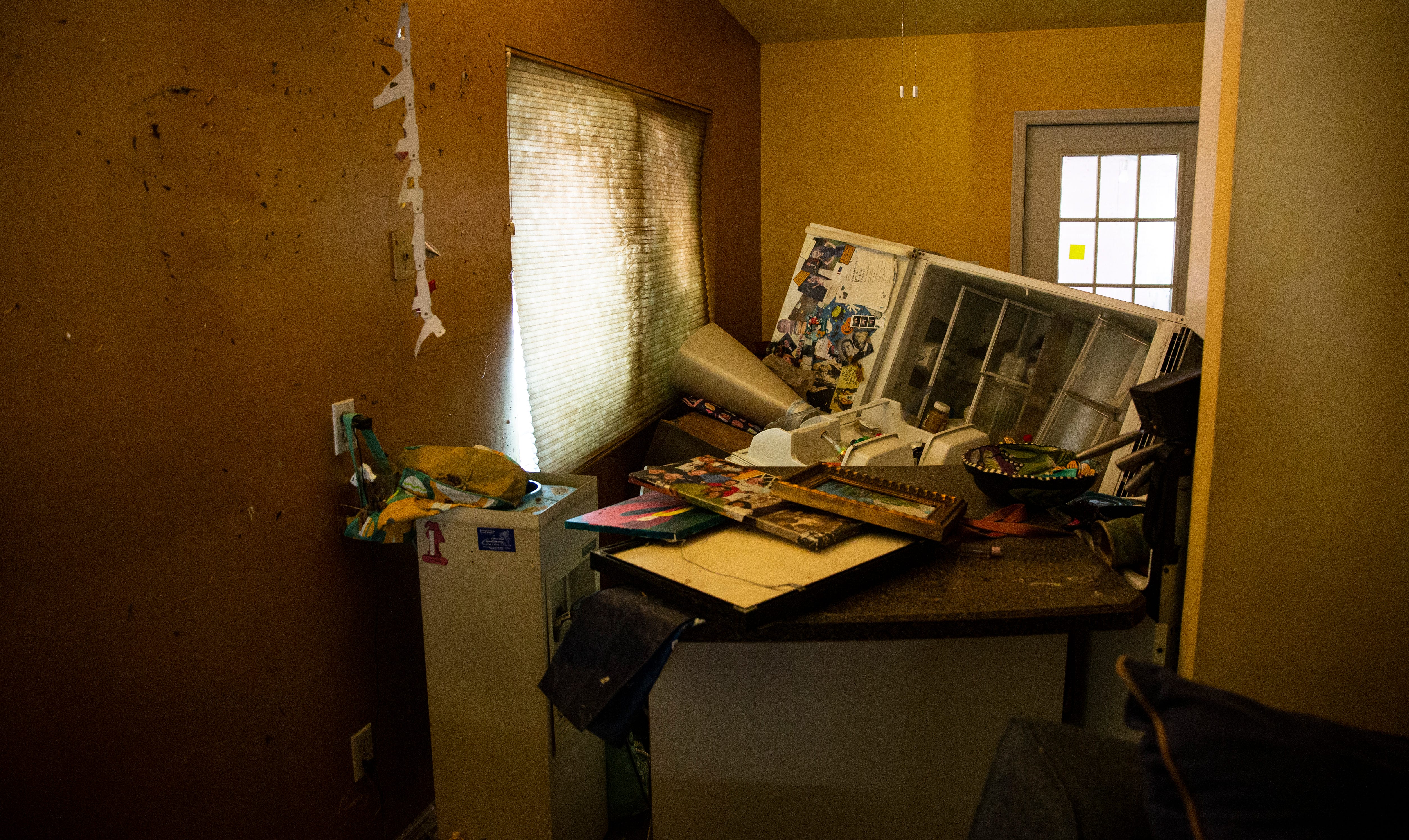 Judi Woods' kitchen area in her home on Hibiscus Drive on Fort Myers Beach on Oct. 11, 2022. Her neighborhood and home were heavily impacted by Hurricane Ian. Her home sustained significant flooding.