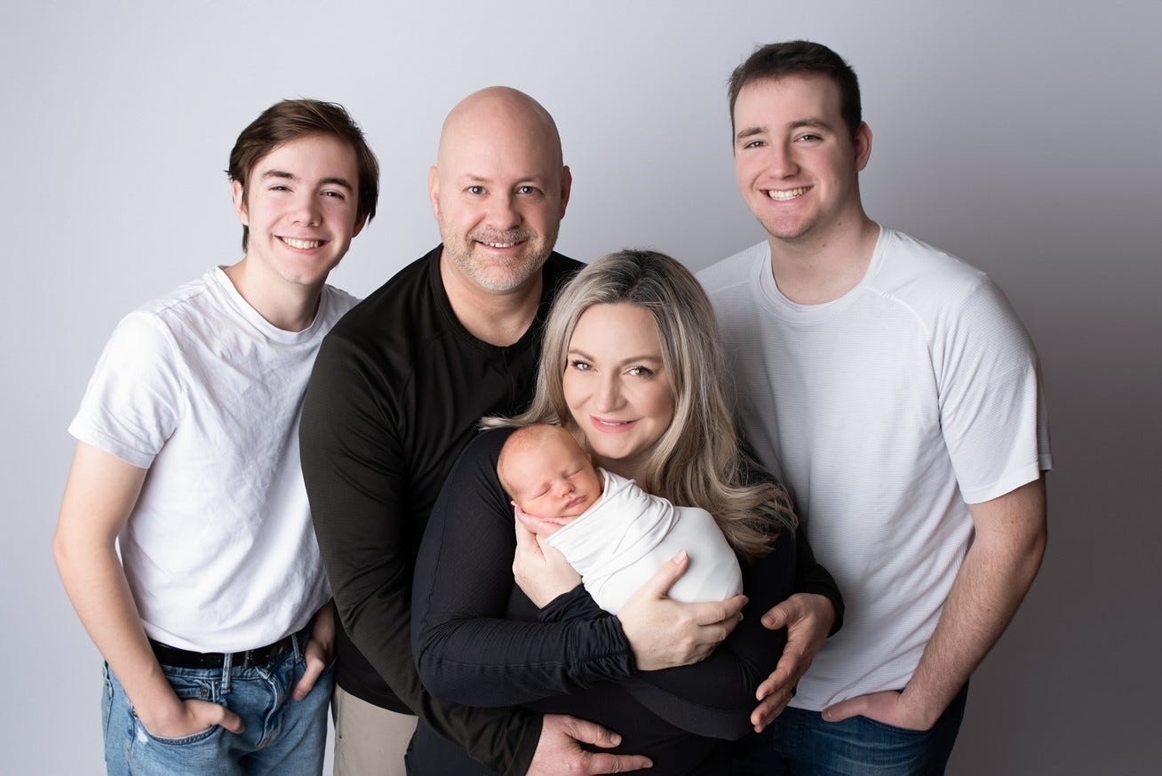 Jenny and Trent Doman with their three sons: Max (right), Paxton (left) and their newborn, John. The couple was traveling with two of their sons, Paxton and John, when their RV caught fire.