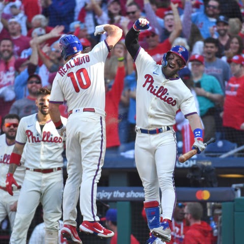 Phillies catcher J.T. Realmuto celebrates his insi