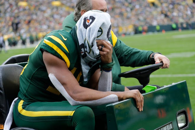 Green Bay Packers wide receiver Randall Cobb (18) is carted off the field in the third quarter against the New York Jets during their football game Sunday, Oct. 16, at Lambeau Field in Green Bay.