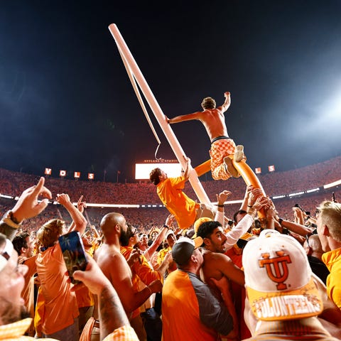 Tennessee fans tear down the goal post after the V
