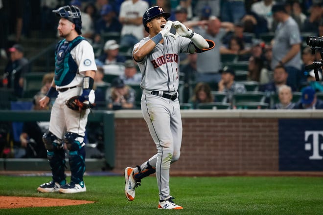 Astros shortstop Jeremy Pena celebrates after a solo home run in the eighteenth inning.
