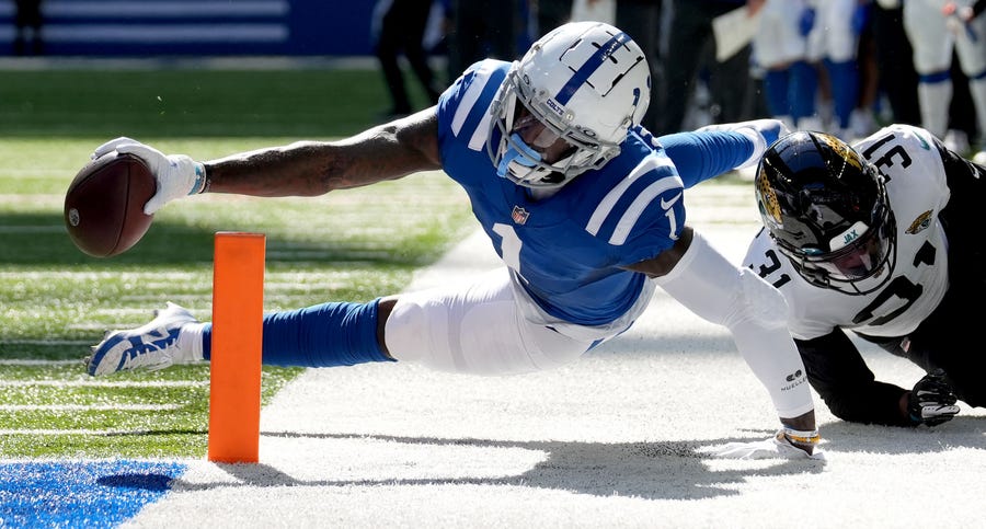 Indianapolis Colts wide receiver Parris Campbell (1) reaches to keep the ball inside the pylon for a touchdown.