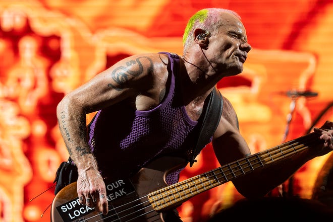Flea of Red Hot Chili Peppers performs on the American Express stage during Austin City Limits Music Festival on Sunday.