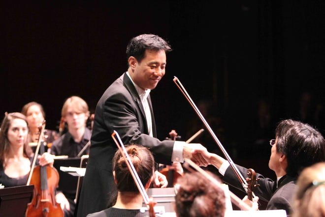 Jin Kim is the conductor and music director of the Atlantic Symphony Orchestra.